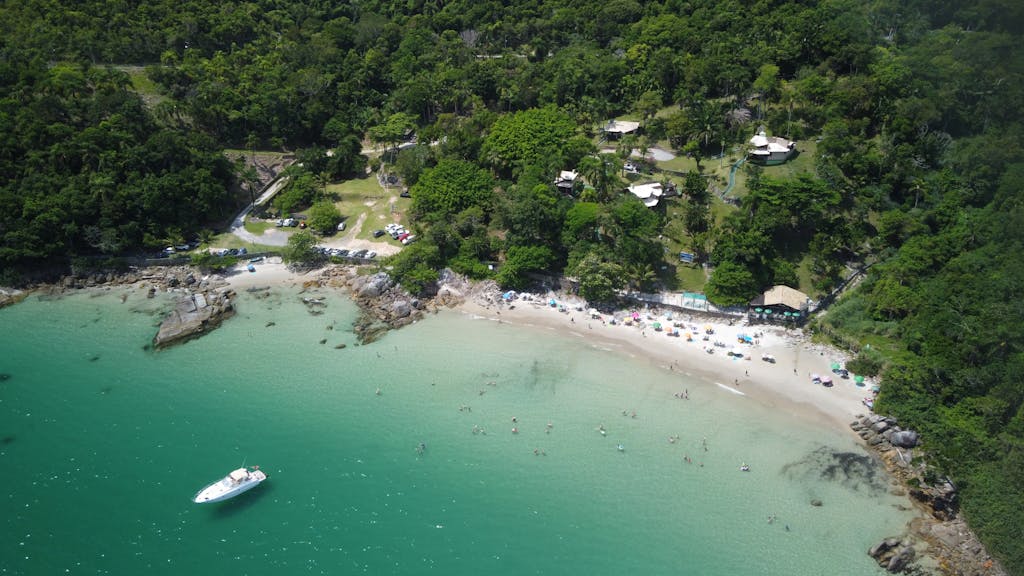 Stunning aerial view of Porto Belo's turquoise waters and lush landscape.